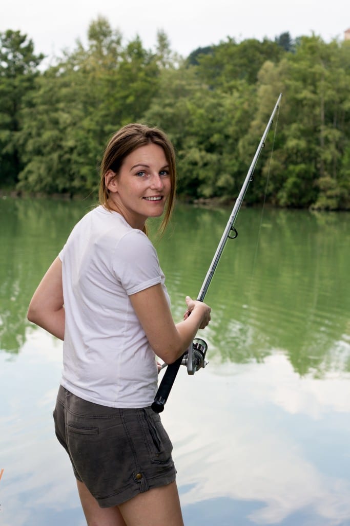 bigstock Woman Fishing At A Lake 40415038 2