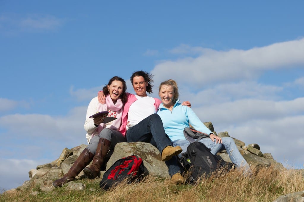 Women enjoying lunch on a hike