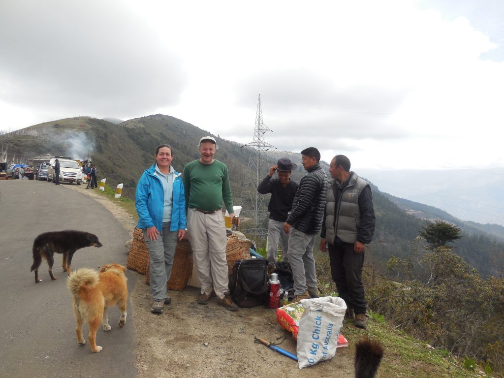 2. My friend Alan and me at the end of our Haa Valley trek with helpers and two dogs that trekked with us the entire three days.