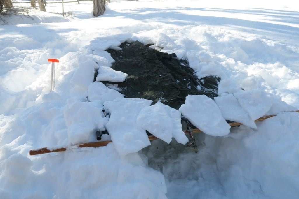How to Build an Emergency Snow Trench Shelter 7