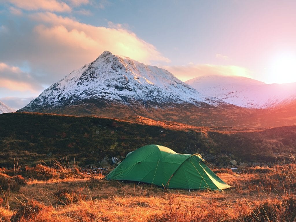 Best Campsites in Scotland 3 bigstock Green Tent And Snowy Mountain 227133109