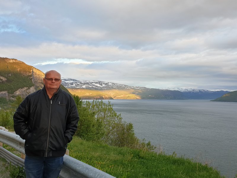 James standing in the midnight sun norway