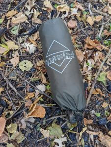 The rain fly and accessories packed inside of the double sided bag are light and compact.